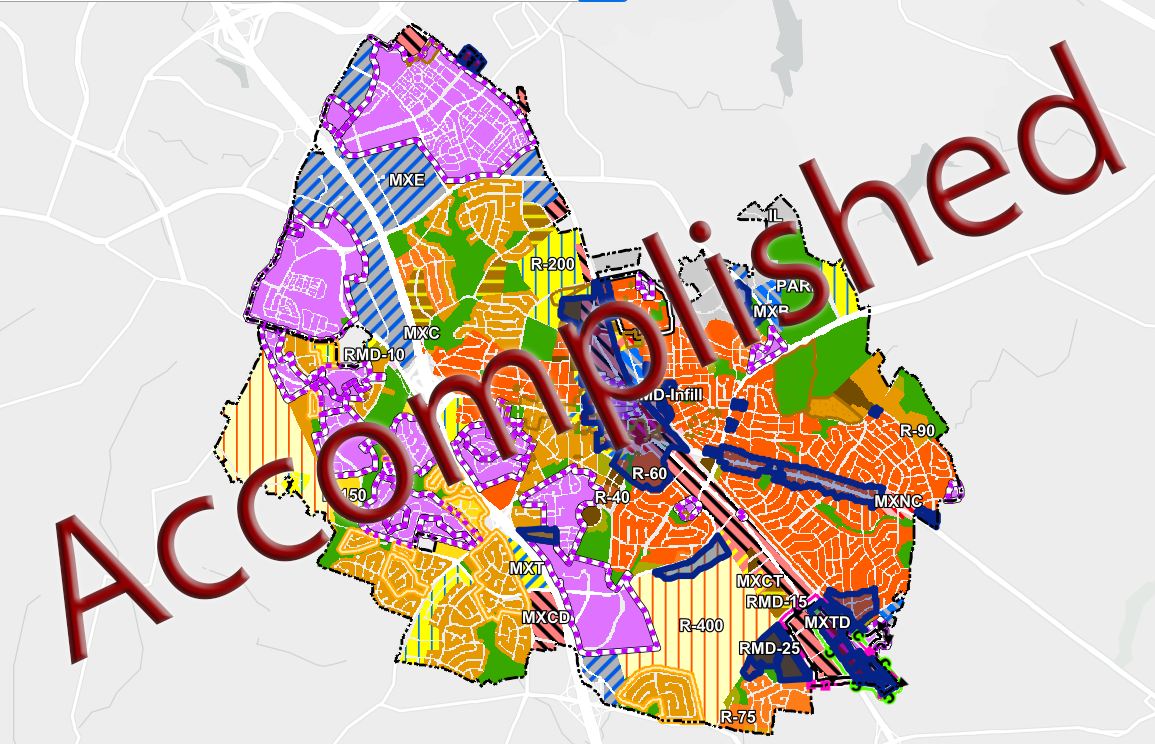 A color-coded zoning map of the city of Rockville with the word 'Accomplished' across it.